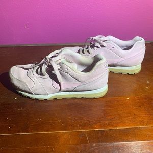 Pink suede Nike shoes